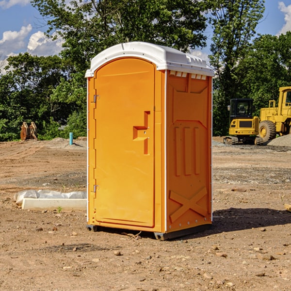 how often are the porta potties cleaned and serviced during a rental period in Carman